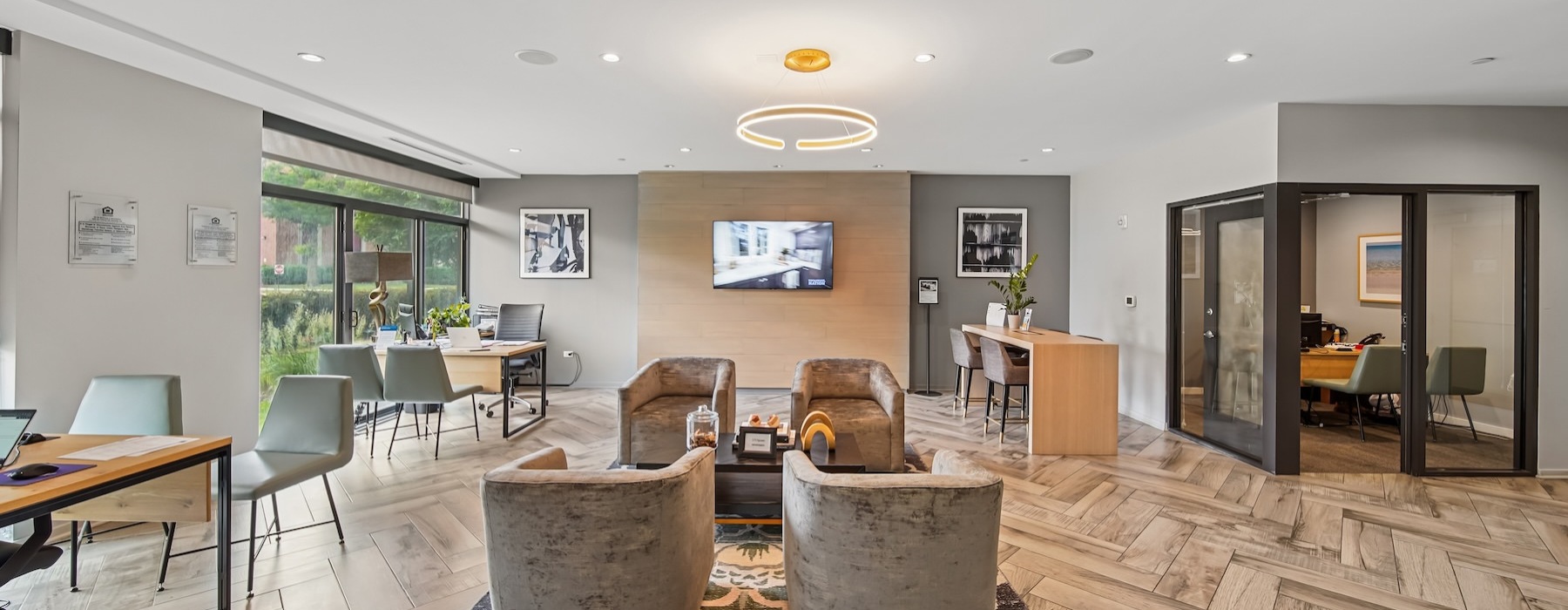 a clubroom with tables and chairs